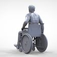 Dis2-.27.jpg N2 Disable man on wheelchair