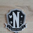 909.jpg Nevermore Academy logo - Wednesday Style Stand