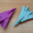Avión de combate articulado e impreso con soporte