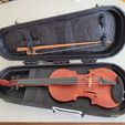 013187c8-14c4-4f5f-95a6-cd60a72f348d.jpeg violin and case  (or viola or cello)