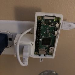 IMG_9807.jpg Free 3D file Raspberry Pi Zero Wall Charger Mount・Template to download and 3D print