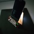 IMG_20230403_120349113.jpg ZELDA LINK'S AWAKENING TRIFORCE PHONE STAND, TEALIGHT