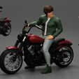 motorbiker-2.jpg Young man sitting on his motorbike - Separated and non separated