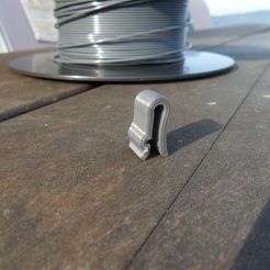 clip1.JPG Filament clip on spool