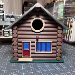 CABANE À OISEAUX EN RONDINS