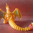 Imagen-de-WhatsApp-2024-08-26-a-las-17.06.23_ccf7e22e.jpg Mega Charizard Y articulated - flexible