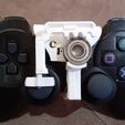 20240304_120816.jpg PlayStation 2 and 3 controller mini wheel