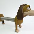 dispenser-toy-story.jpg Slinky paper towel holder