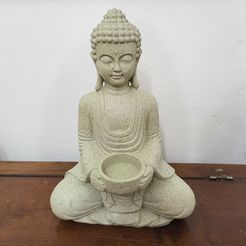 1000017325.jpg Buddha with candle holder sculpture