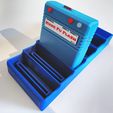 5e10defc-52f1-4692-a76f-9cf151c35a9e.jpg C64 cartridge stand