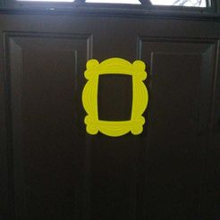 DoorFrame.jpeg Yellow Peephole Frame