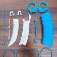 Disassembled-Parts.jpg Toy OTF Karambit Switchblade (Double Action)