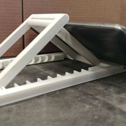 0104180847.jpg Bigger Universe Folding Cell Phone and Tablet Stand - Great for Airplanes