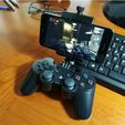 f3ccdd27d2000e3f9255a7e3e2c48800_preview_featured.jpg Universal smartphone mount for DUALSHOCK 3 (PS3 controller)