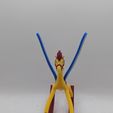 PXL_20260216_203721268.jpg Alice in Wonderland rocking horse figurine