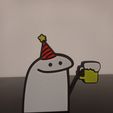1670261211325.jpg Flork with beer and party hat