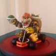 Bowser_1.jpg Italian and Turtle Riding Glorified Lawnmowers