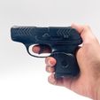 IMG_4029.jpg Pistol Ruger LCP Prop practice fake training gun