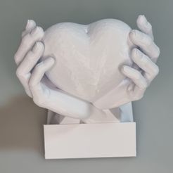 20220205_173437.jpg Hands holding Heart