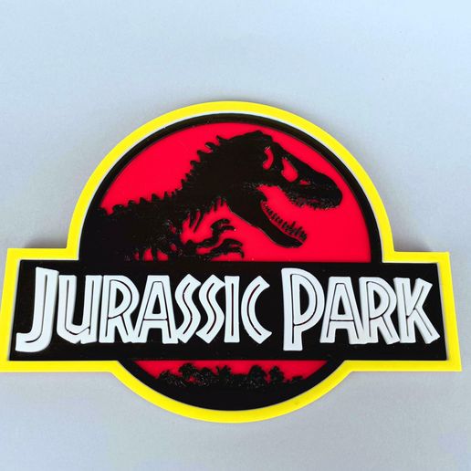 Llavero Metálico Redondo De Jurassic Park – T-Rex Emblemático, Color Negro, Accesorio Coleccionable