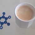 15_-_2_display_large.jpg This is the caffeine molecule, you can use it as a coffee mug placemat