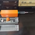 1642278688921.jpg Mini syringe pump with parts from optical drive