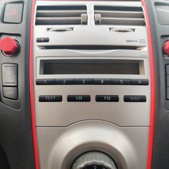 IMG_20240407_184128.jpg Toyota Yaris II with our personalized Radio Knob Enhancers