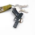 IMG_5093.jpg PISTOL Glock 17 keychain.