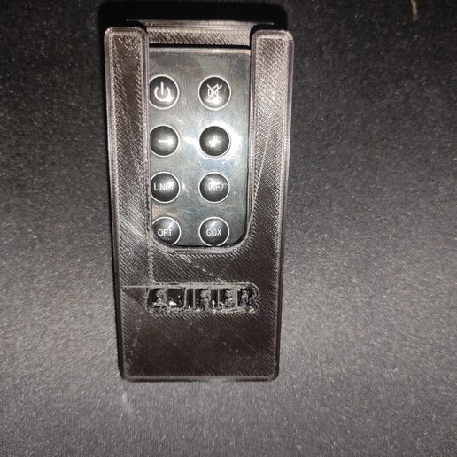 79f98a46-5719-4b75-977b-be12e7810020.jpg Remote control speaker holder