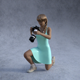 womankneelpic1.png Photographer kneeling reviewing