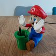 1000014627.jpg Mario Phone Holder