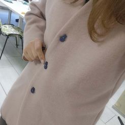 Botón con forma de gato