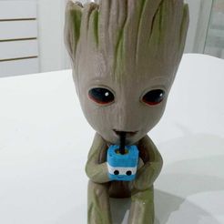 b7ada553-1f51-4280-ba9d-d95e7a146d11.jpg Groot's mate drinking mate in a Groot's mate