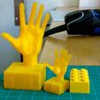 doblo-lugo-hands_display_large.jpg Hand on duplo-compatible block