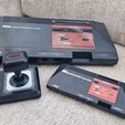 20231015_170539.jpg Sega Master System, buttons and mini cart