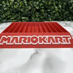 IMG_6613.jpeg Archivo STL Soporte para juegos Mario Kart Nintendo Switch・Diseño de impresora 3D para descargar