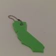FILE3635.jpg Phelps3D States and World Set of 4 Keychains