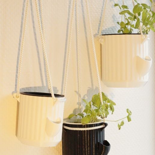 1675e39a95e8b189014a872cec556fa3_display_large.JPG Self-Watering Planter
