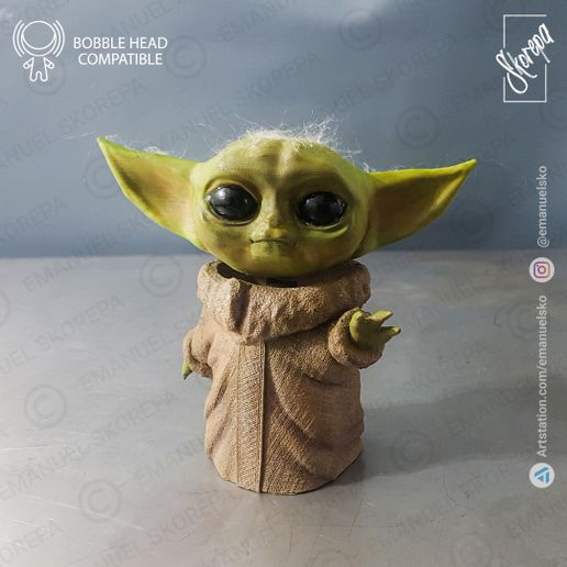 foto.jpg BABY YODA BOBBLE HEAD