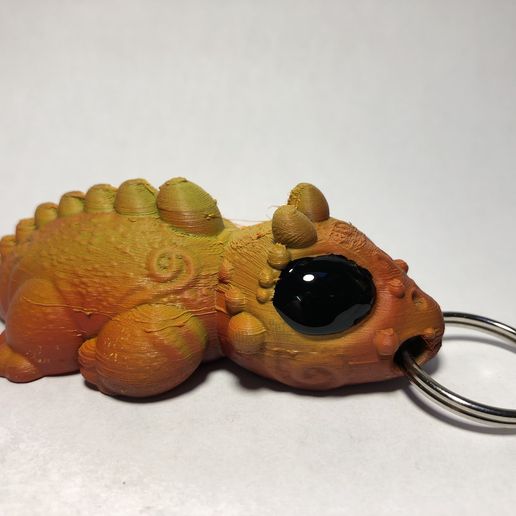 yS7uHDgQTxi1dGWpu5OPYA.jpg Dragon Keychain flop