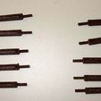 Stakes_with_rods.jpg Stakes for UTJ's flatbed car 1:32