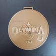 IMG_20240927_124847.jpg M. Olympia 2025 médaille 3D stl.file