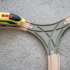 wooden_train_3way_1.jpg 3-way wooden train track split compatible with Brio and Ikea