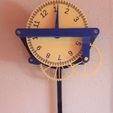 ty, N My s 7/14 days pendulum clock with pointer disc