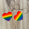 Corazones_LGTB_fondo-madera.png Llavero Corazon LGBT