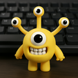 Change-the-backgroun.png Cute Yellow Four-Eyed Alien Toy  3D Print Model