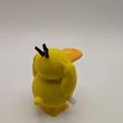 PXL_20250617_163551158.jpg Psyduck Wind Up Walker