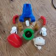 1000014628.jpg Mario Phone Holder