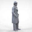 HatG-.21.jpg Man wearing bowler hat and trench coat