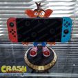 rend_2_large.jpg Crash Bandicoot hold Nintendo Switch